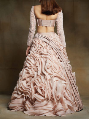 Pink Peacock Couture -  Blush pink embroidered ruffle lehenga with corset full sleeve blouse - Image 2