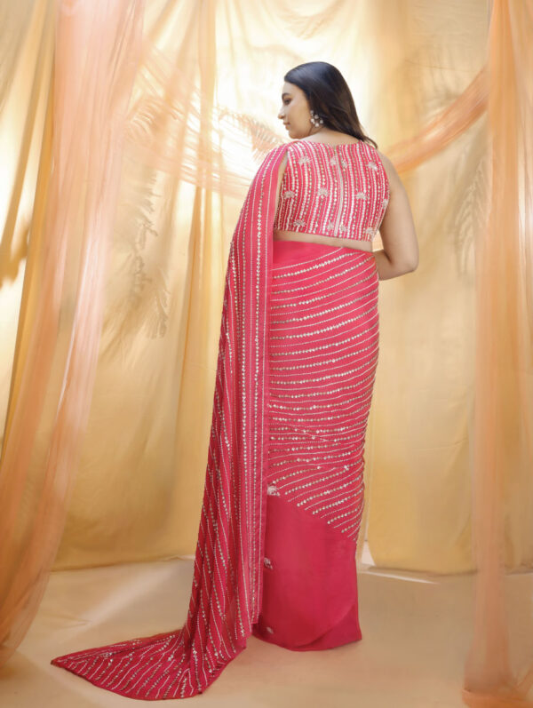 PINK PEACOCK COUTURE – Hot pink saree with sleeveless blouse