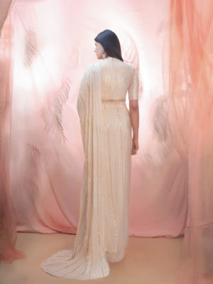 PINK PEACOCK COUTURE – Golden saree with an elbow sleeve blouse - Image 2