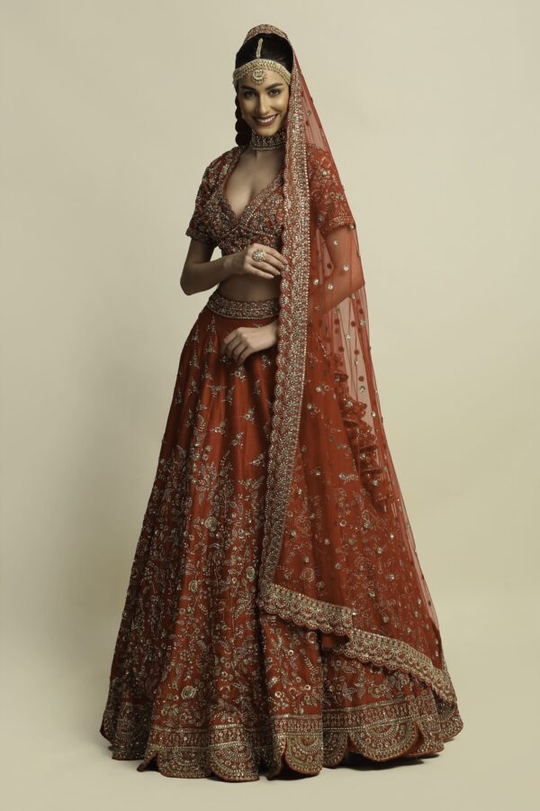 Priyanka Jain  Red Bridal lehenga with intricate hand embroidery
