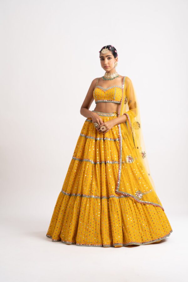 Vvani Vats Yellow Noodle Strap Multi Tier Lehenga Set