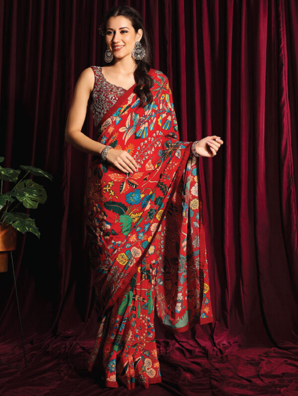 Aayushi Maniar - PRINTED SAREE WITH A HEAVY EMBROIDERED BLOUSE