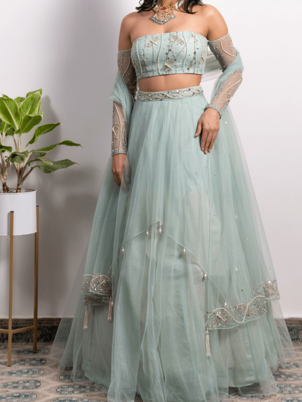Silky Bindra OFF-SHOULDER EMBROIDERED BLOUSE WITH PEARL TASSELED LEHENGA AND DUPATTA