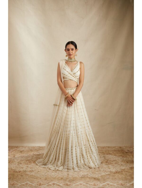 Astha Narang - WHITE WITH GOLD WORK LEHENGA SET