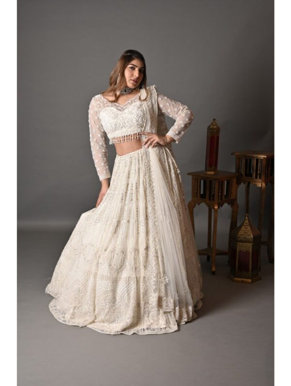Kalighata - Ivory heavily embroidered lehenga