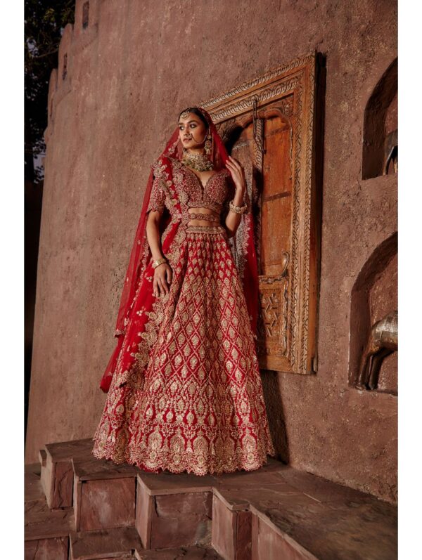 Nikita Gujral- RED RAW SILK LEHENGA SET LEATHER APPLIQUE