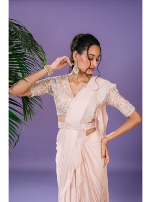 Pritika Vora -  light peach ruffle sare with multi coloured elbow sleeve blouse and belt - Image 3
