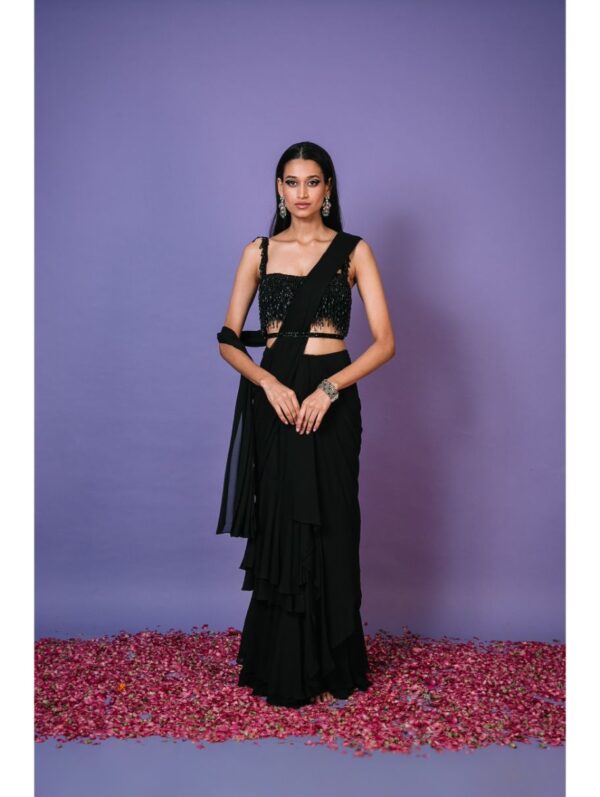 Pritika Vora - black layered saree with tassel blouse and belt