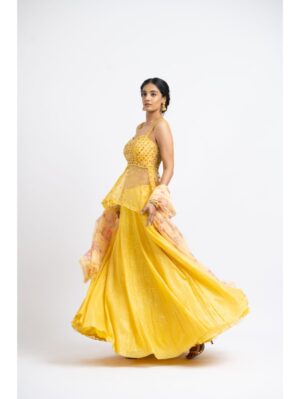 Nikita Gujral- BRIGHT YELLOW NET PEPLUM WITH GEORGETTE MOKAISH LEHENGA AND PRINTED DUPATTA - Image 3