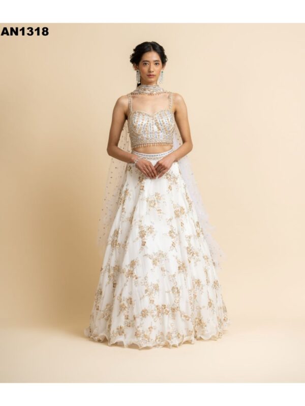 Nikita Gujral- OFF WHITE EMBROIDERED LEHENGA WITH BUSTIER AND STYLISED DUPATTA