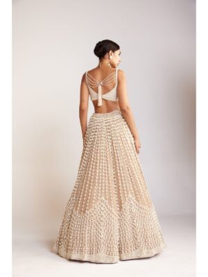 Vvani Vats - Beige chandelier pearl lehenga paired with sleeveless pearl drop sweetheart neck blouse - Image 2