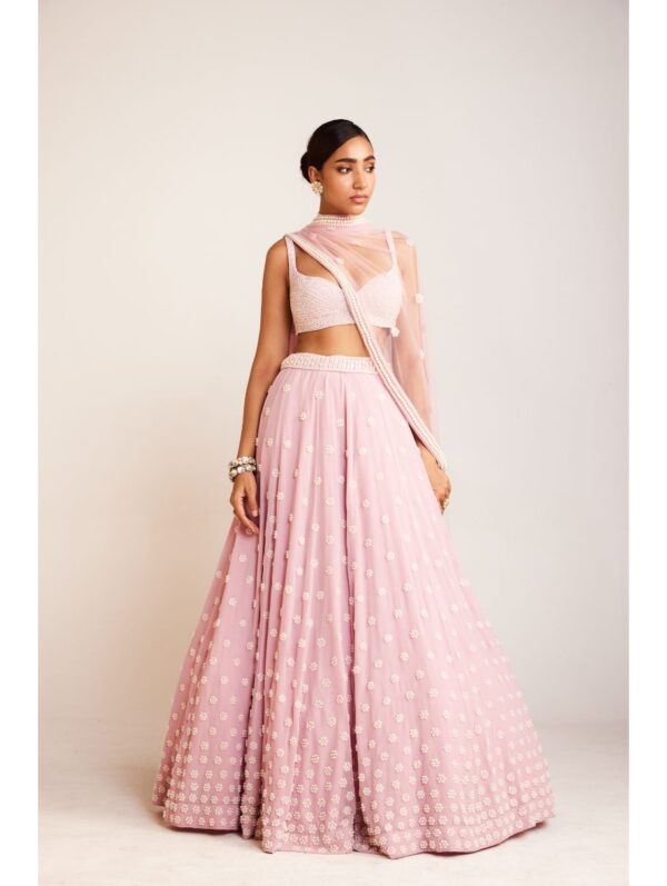 Vvani Vats - Powder pink pearl flower lehenga paired with pearl drop full sleeve blouse