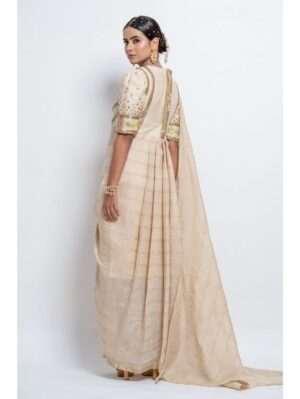 Abstract by Megha - Featuring a concept saree  drape dress with v neck, elbow puffed sleeves, golden sequins & beads - Image 2