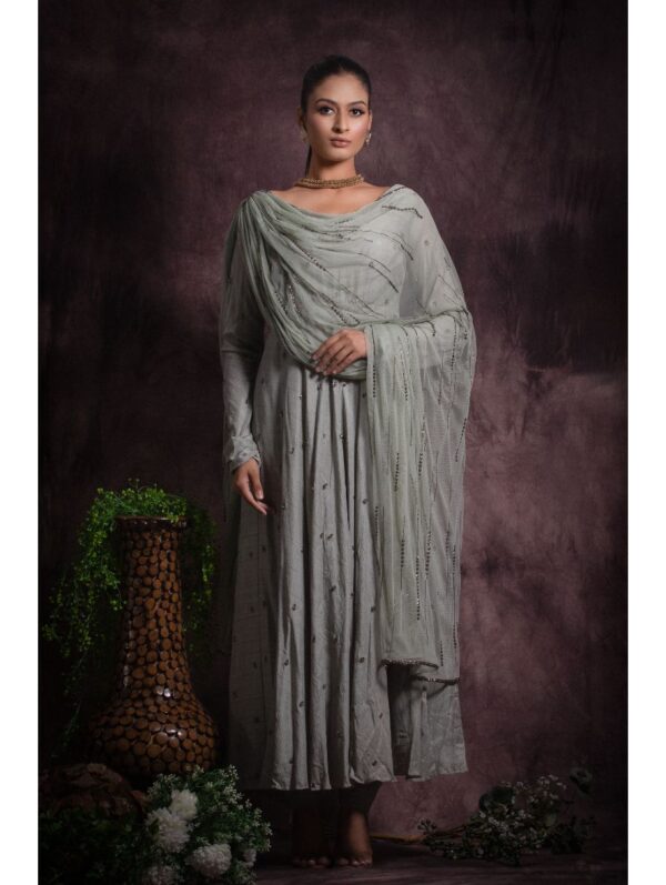 Abstract by Megha - Featuring anarkali full sleeve dress paired with pants and attached dupatta on shoulder