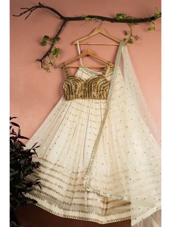 Anisha Shetty - BEIGE MULTIPANEL GOLD LEHENGA SET WITH GOLD BLOUSE