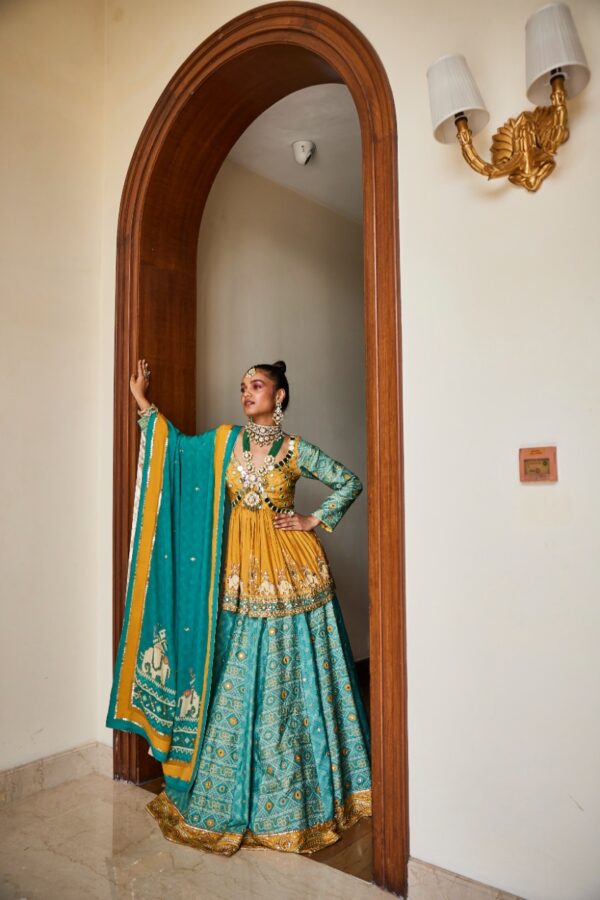 The Royaleum - PEPLUM TOP WITH LEHENGA PAIRED WITH PRINTED DUPATTA