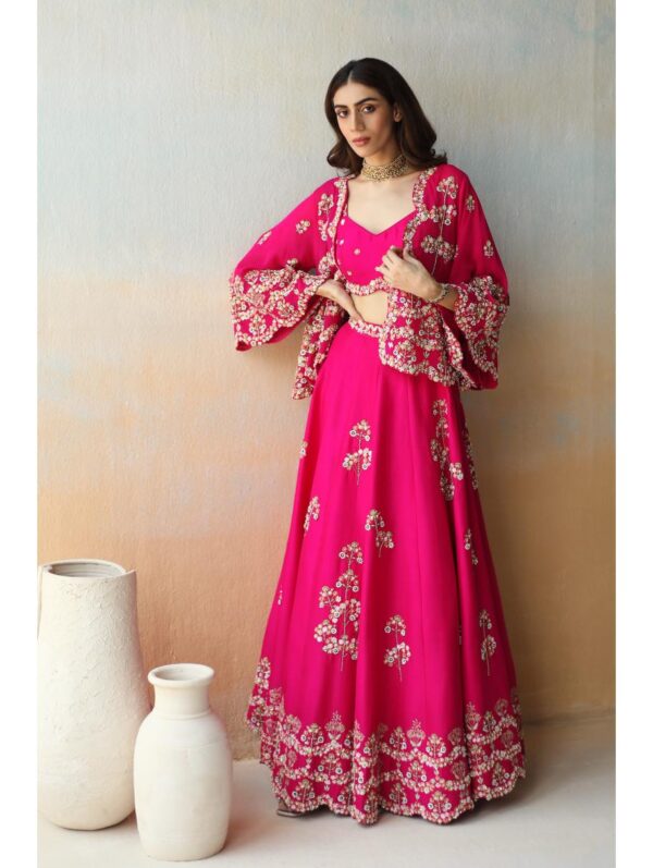 Aman Takyar - fuchsia pink lehenga and blouse in dupion silk base and embroidered georgette cape